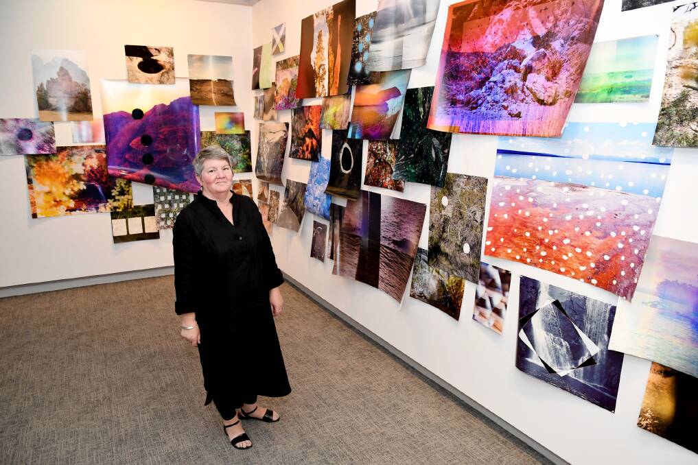 New Horsham Regional Art Gallery director Brenda Wellman with some of the current works on display at the gallery. Picture: SAMANTHA CAMARRI