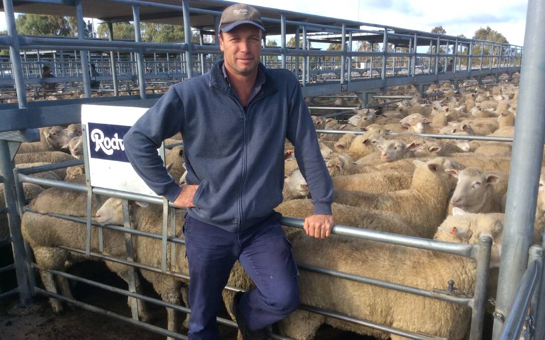 Brimpaen farmer Luke Dunn with the record breaking sheep. Picture: CONTRIBUTED