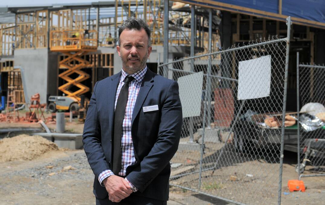 Horsham's Holy Trinity Lutheran College principal Daniel Weller in front of the construction site of the school's senior building in November 2018.