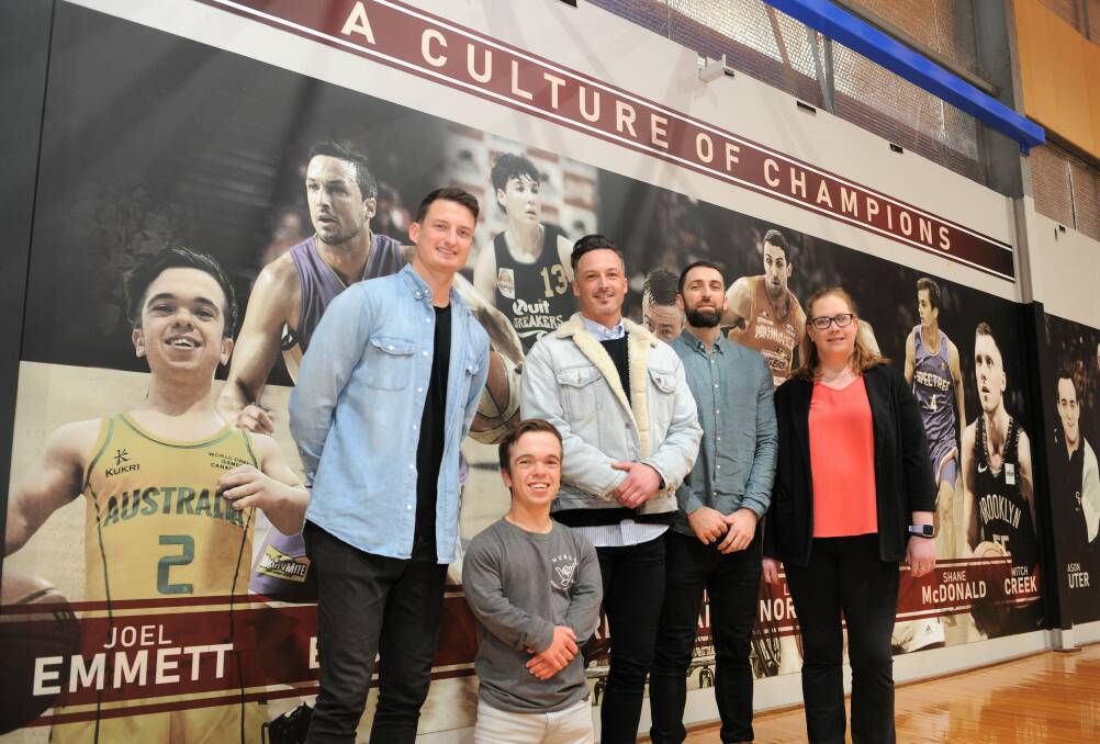 CHAMPIONS: Shaun Bruce, Joel Emmett, Aaron Bruce, Liam Norton and Steph St John in front of Horsham Basketball Association's 'A Culture of Champions' mural, which was unveiled at the Horsham Basketball Stadium on Sunday. Picture: JADE BATE
.