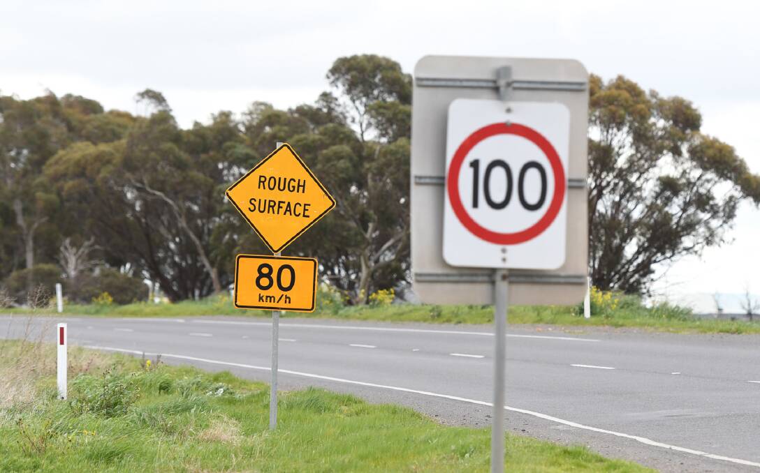 This rough surface sign is less than 10 metres after a 100km/h sign on the Henty Higwhay near the Dooen Hotel. Picture: SAMANTHA CAMARRI