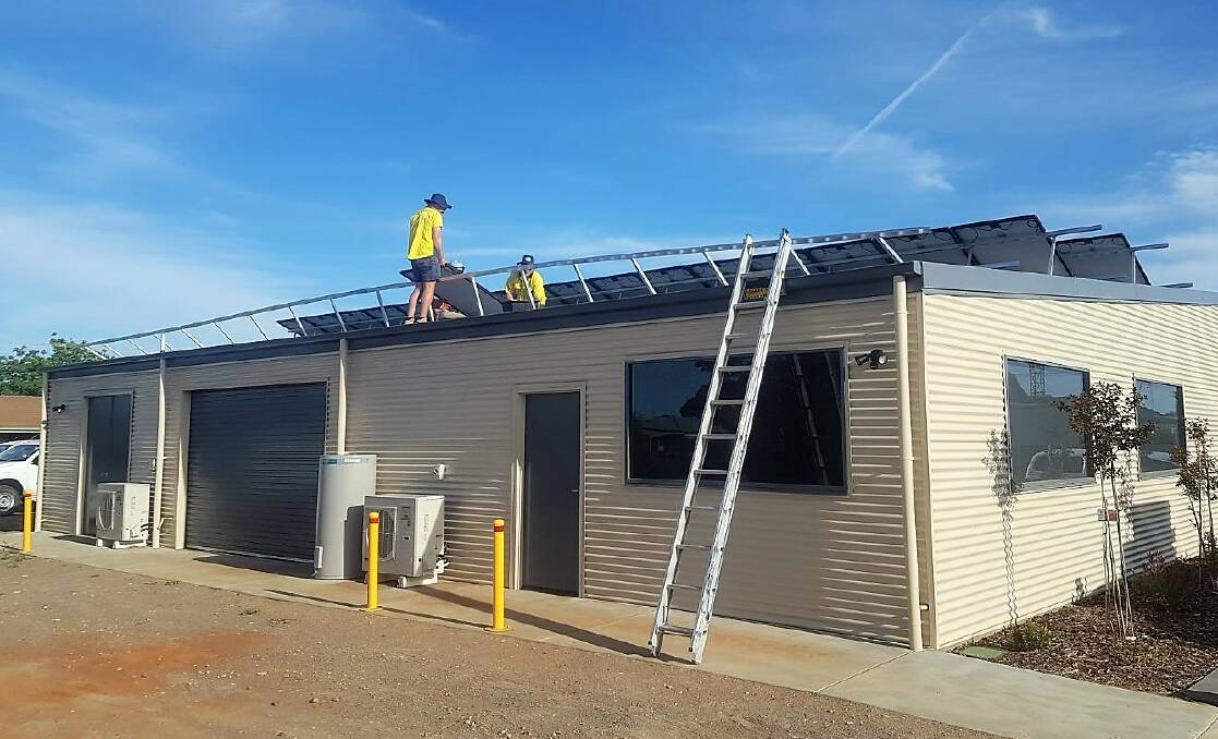 Solar panels being installed at Birchip Cropping Group's facility as part of its new microgrid. Picture: CONTRIBUTED