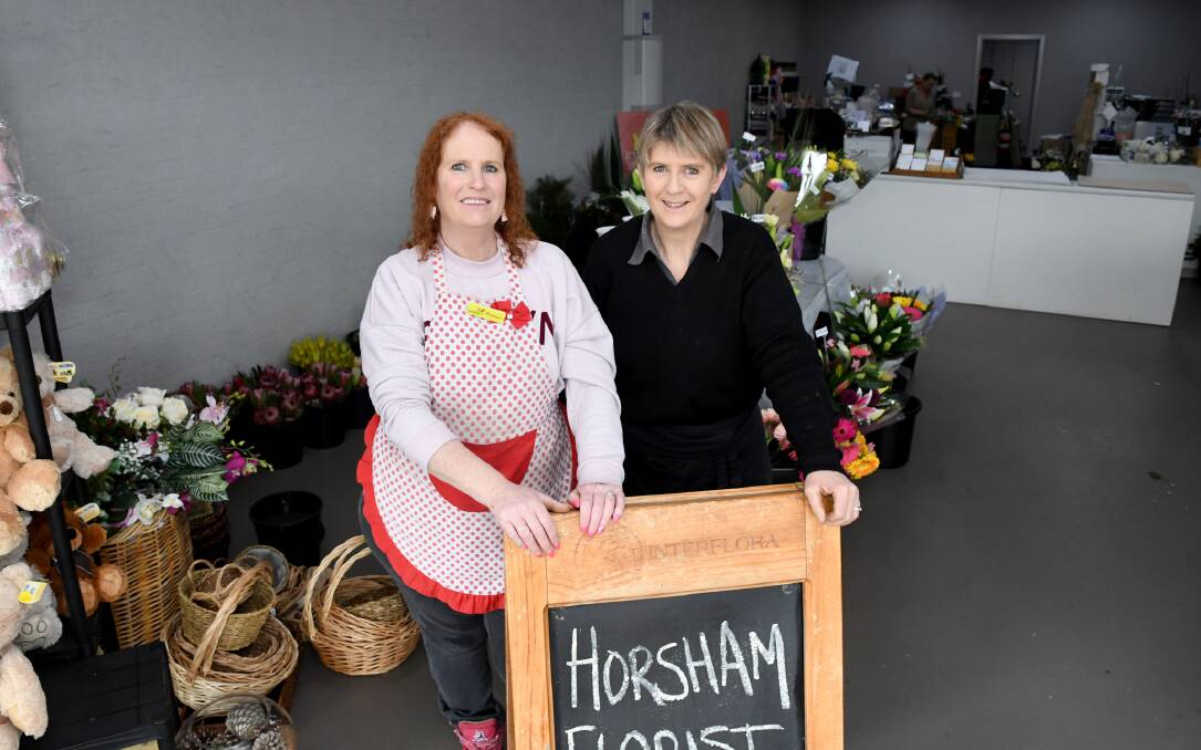 BACK HOME: Horsham Florist co-owners Rosemary Arnott and Susan McQueen have moved back to their original home on Roberts Avenue after it was gutted by fire in November. Picture: SAMANTHA CAMARRI