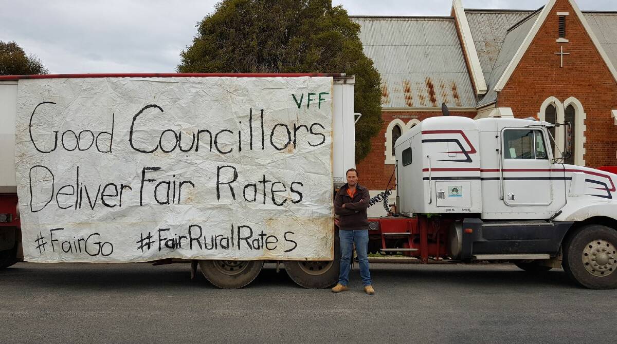 FRUSTRATION: VFF president David Jochinke created a sign asking councillors to give farmers a fair go with farm rates. Picture: CONTRIBUTED
