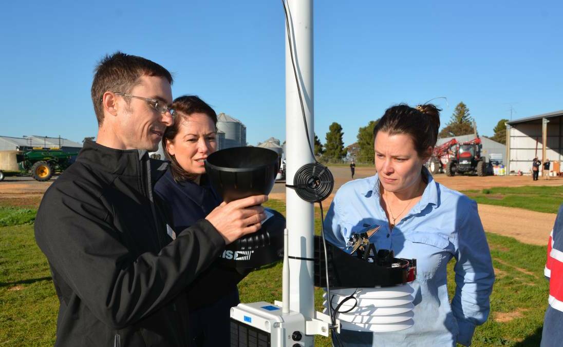 Co-ordinator of the Birchip's Internet of Things trial Mark Gould with Agriculture Minister Jaclyn Symes and farmer Georgie Walsh in July. Picture: CONTRIBUTED