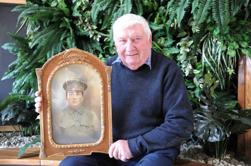 FATHER AND SON: Nhill resident Ellis Dart with a photo of his father Edward "Bud" Dart, who fought in the the First World War. Bud's service will be recognised later this month. Picture: JADE BATE