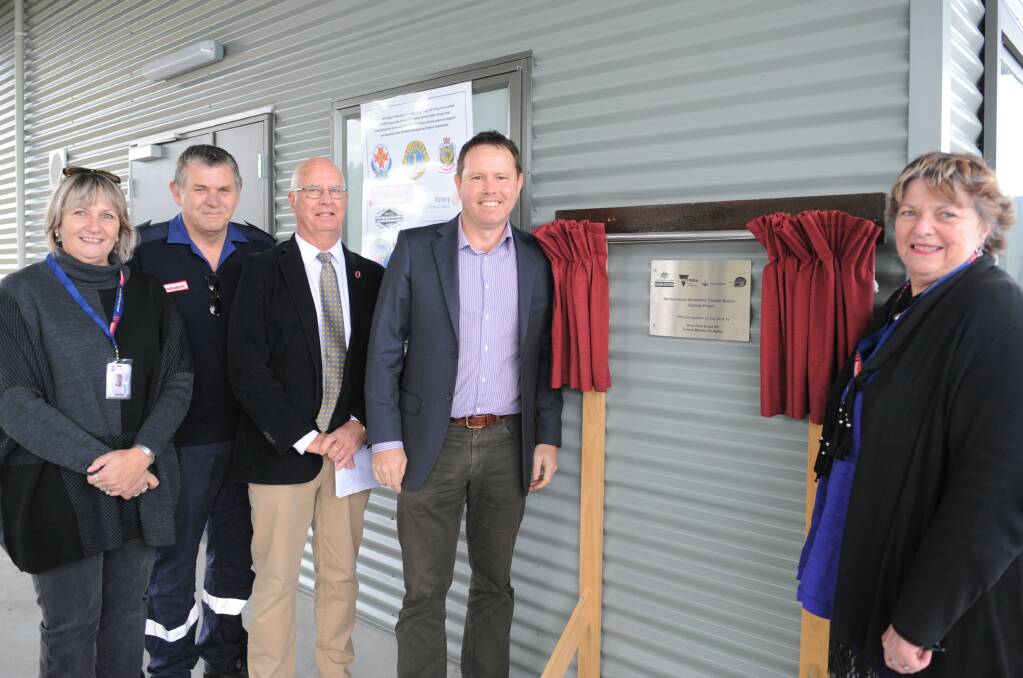 Warracknabeal Ambulance Auxiliary members Sue and Malcolm Watts, Yarriambiack Shire Council mayor Graeme Massey, Member for Mallee Andrew Broad and Watsup chairperson Mandy Bryce opened the Warracknabeal airport patient transfer station on Monday. Picture: JADE BATE