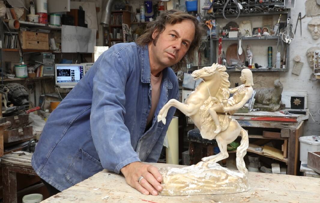 London-based sculptor Corin Johnson with the sculpture prototype of Nick Cave. Picture: CONTRIBUTED