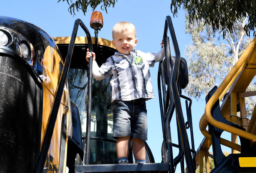 Luke Perris, of Kewell, checking out a new tractor at the 2019 Wimmera Machinery Field Days. Picture: SAMANTHA CAMARRI