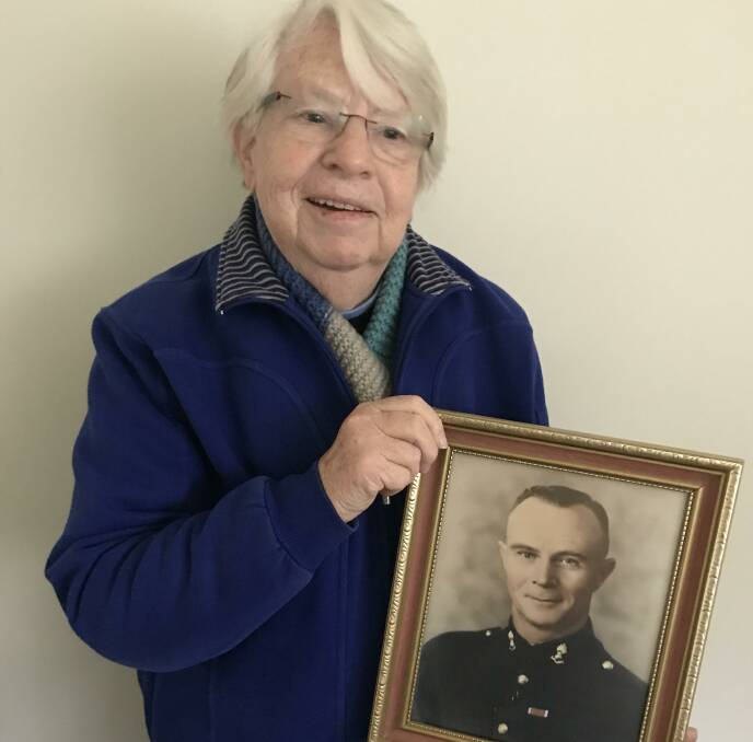 War baby, Sheila McConnell says hello to a portrait of her father Lieut Thomas James Courtney every day.