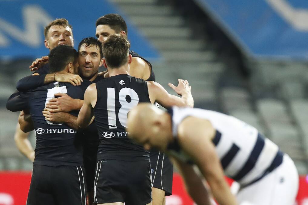 Blues players celebrate their first win of the season, a victory over Geelong, on Saturday at GMHBA Stadium. Photo: Daniel Pockett/Getty Images
