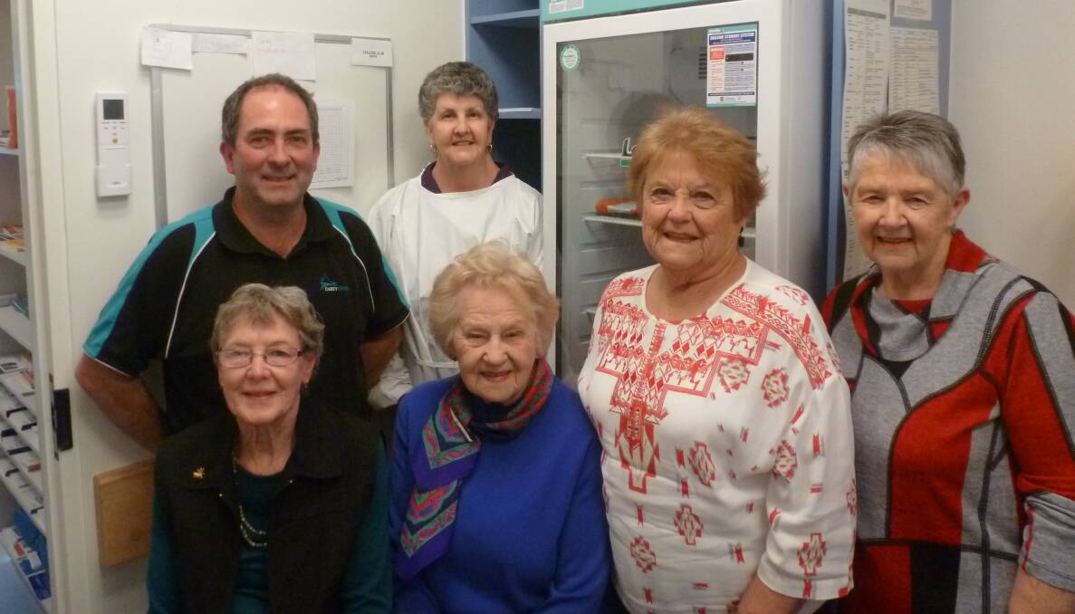 ​TEAMWORK: Peter Carey, Linda Farrer, Fay Cadzow, Betty Gross, Doreen Bibby and Merrilyne Middleton with the new oncology fridge in the background. Picture: CONTRIBUTED
