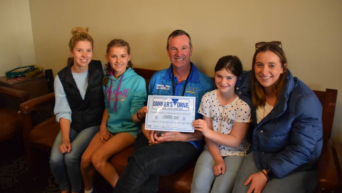 Stawell Primary School's Lisa Fleming, Kayla Membrey, Millie Humphrey and Michaela Armer with Neale Daniher (centre)