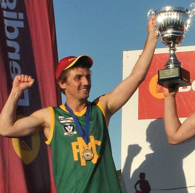 Daniel Parkin after winning one of Navarre's four consecutive premierships.