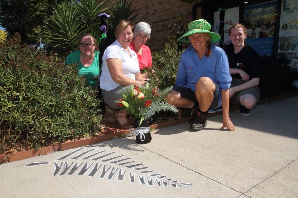 Evelyn Henderson, Lisa Arnfield, Bev Bachelor, Bev Isaac and Jordan Gorter with Stawell Neighbourhood House's Christchurch tribute. Picture: PETER PICKERING