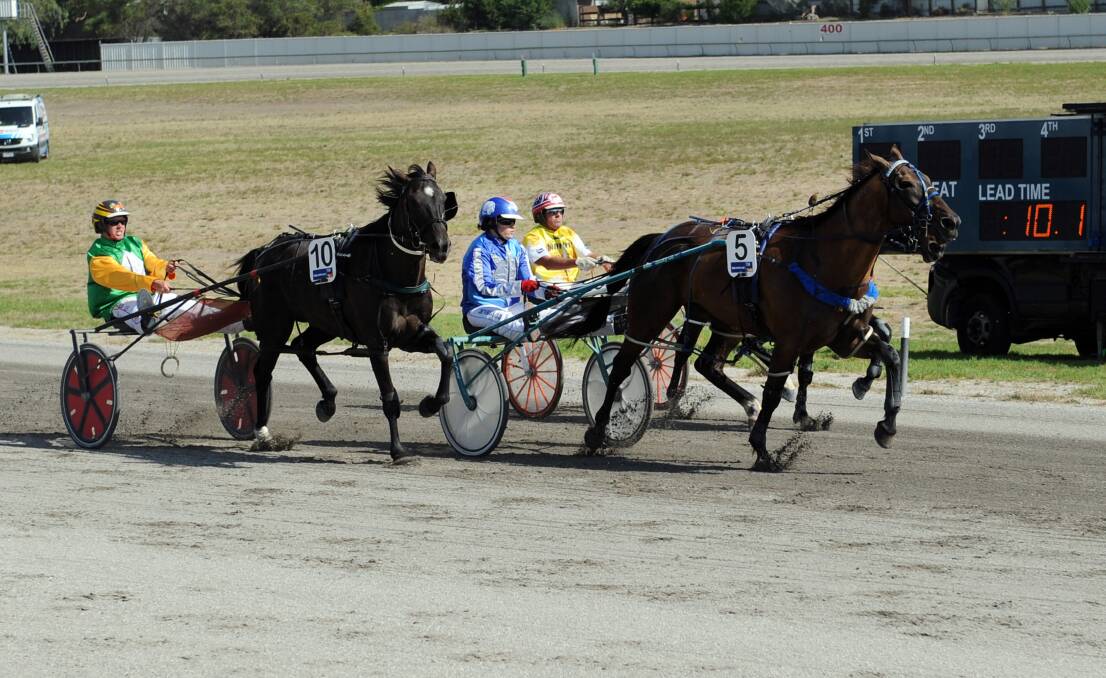 IN ACTION: Denbeigh Wade drives Aheadofhistime to victory in the Laidlaw Family Pace at Stawell Harness Racing Club's 60th anniversary meeting, which was held on Australia Day.