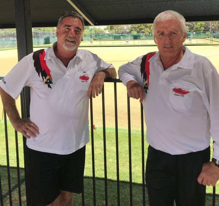 CLOSE BATTLE: Craig Decker and Geoff Bald fought out Coughlin Park's club singles championships for men. It was an exciting day of bowls with a number of spectators in attendance and some close contests.