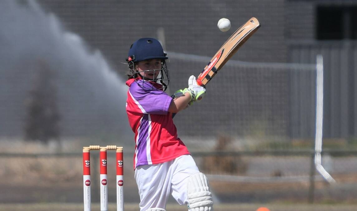 AMONGST THE RUNS: Horsham Sixers' Lily Reading smashes one into the legside during last year's competition. Picture: MATT CURRILL