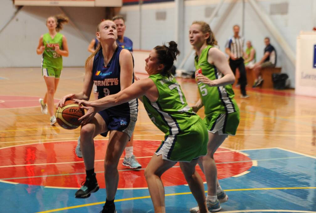 Lady Hornets' Faith McKenzie drives to the basket against Warrnambool last season. Picture: RICHARD CRABTREE