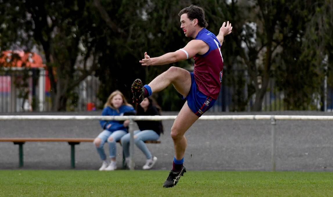 Ben Lakin sends the ball up-field. Picture: SAMANTHA CAMARRI