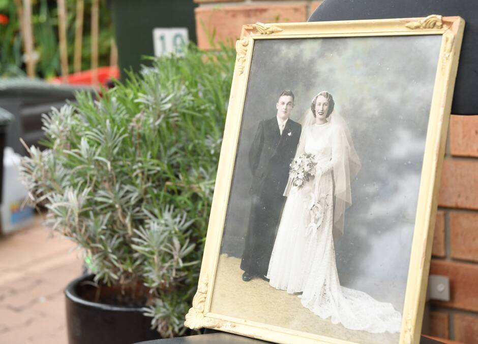 Keith and Alice's wedding photo proudly on display. 