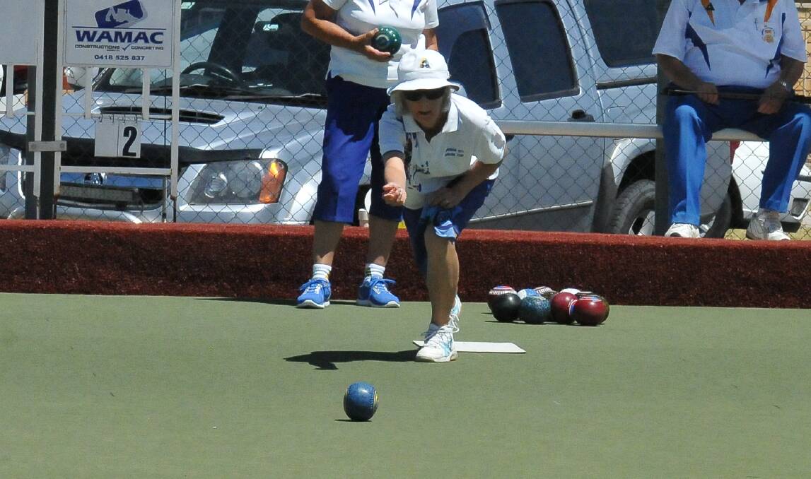 DELICATE HAND: Bev Bretag from Horsham City Bowling Club guides one down the green. Picture: ALISON FOLETTA