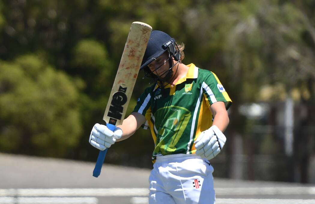 RAISE THE BAT: Wimmera-Mallee's Noah Berry celebrates his half-century in the under-15 country week grand final. Picture: MATT CURRILL