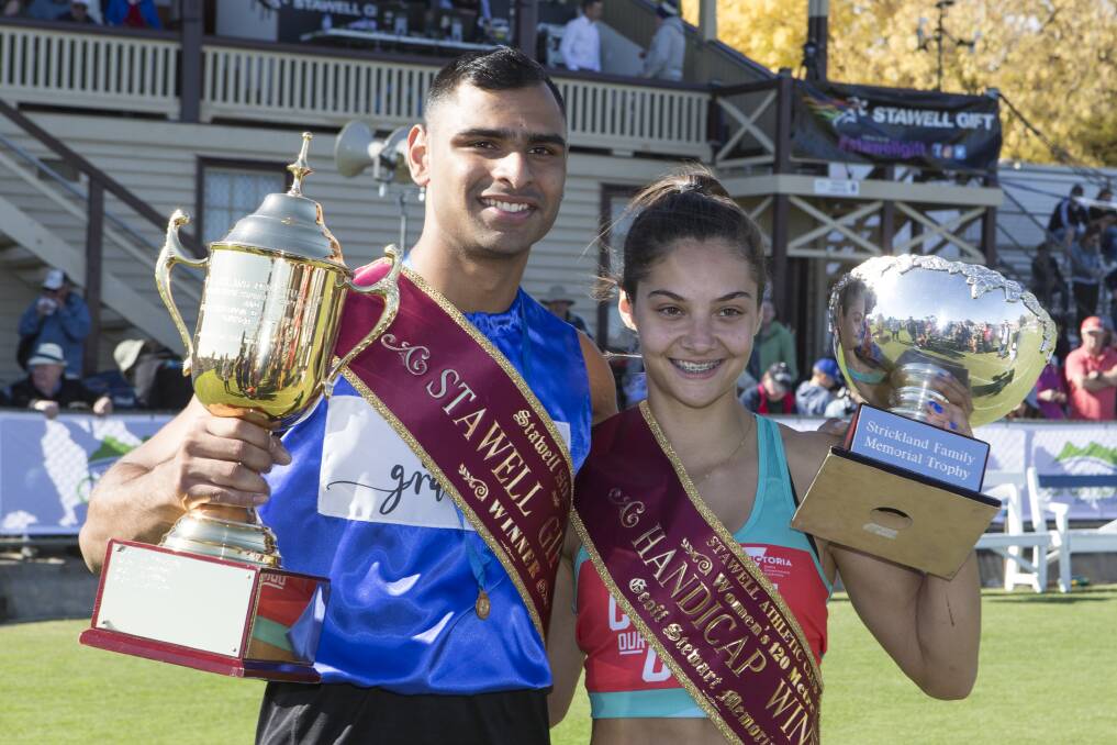 2019 Gift winners Dhruv Rodrigues Chico and Alexia Loizou with their trophies. Picture: PETER PICKERING