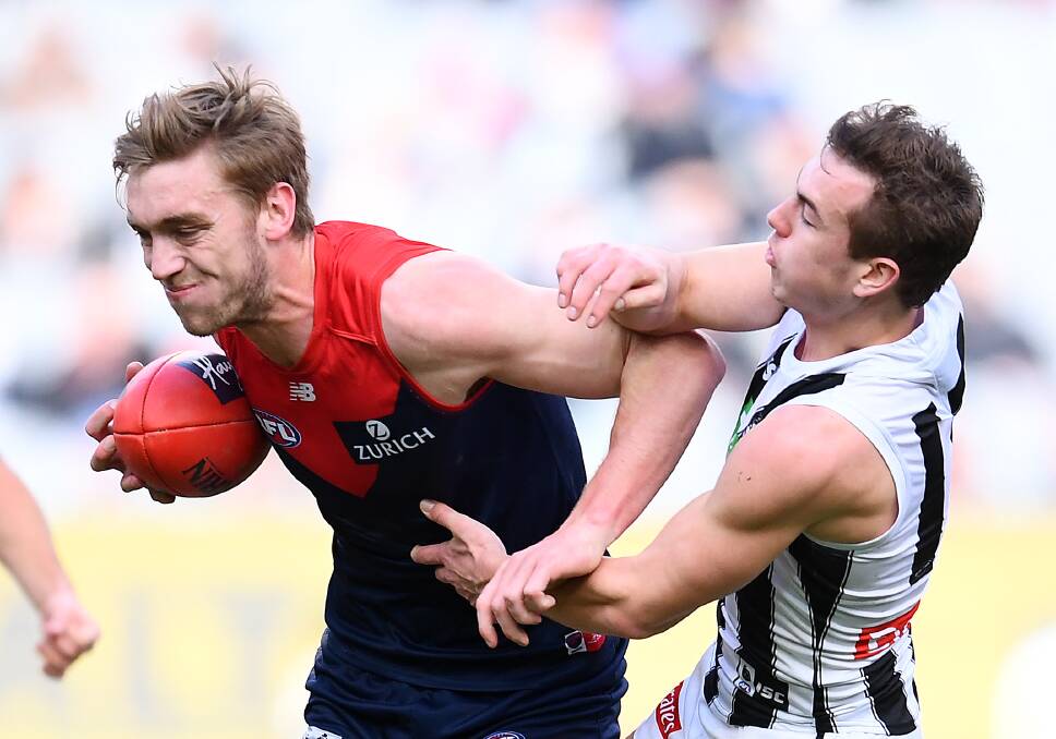 CONTEST: Oscar McDonald in action for the Demons. Picture: MELBOURNE MEDIA