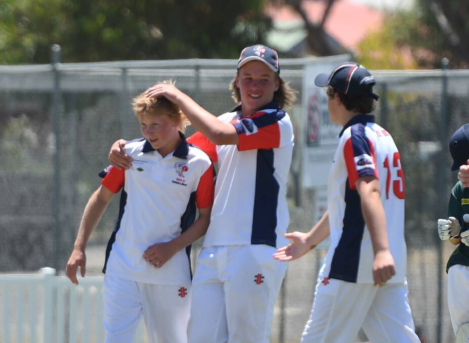 YOU BEAUTY: Logan Millar and Jackson Hoffman celebrate a wicket on Thursday. Picture: MATT CURRILL