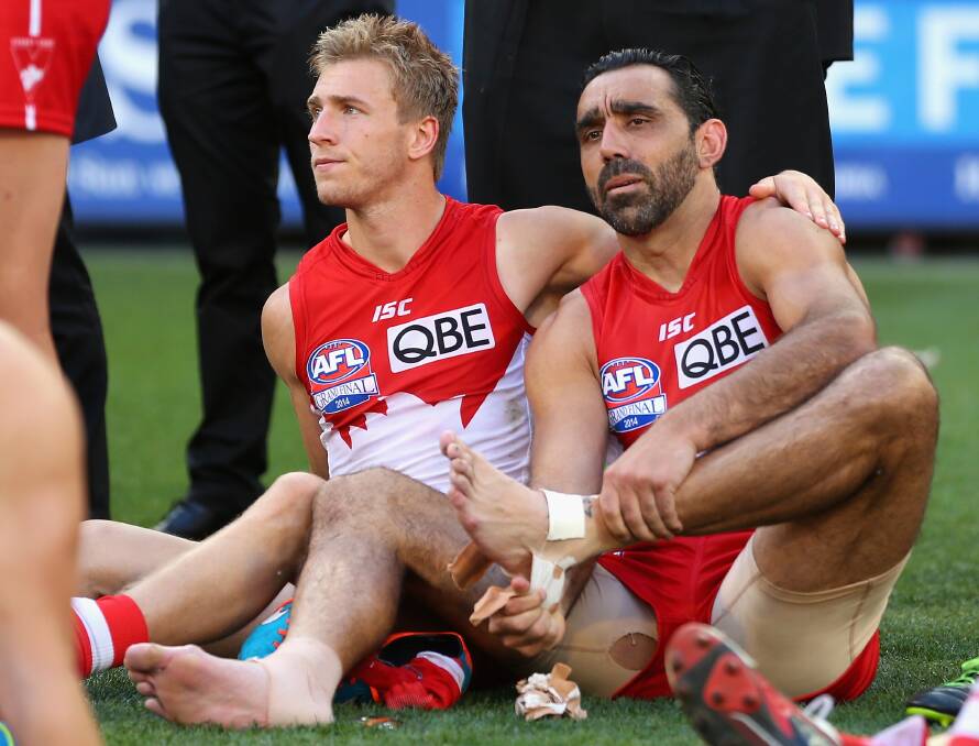 Adam Goodes and Kieran Jack after the 2014 AFL grand final. Picture: QUINN ROONEY/GETTY IMAGES