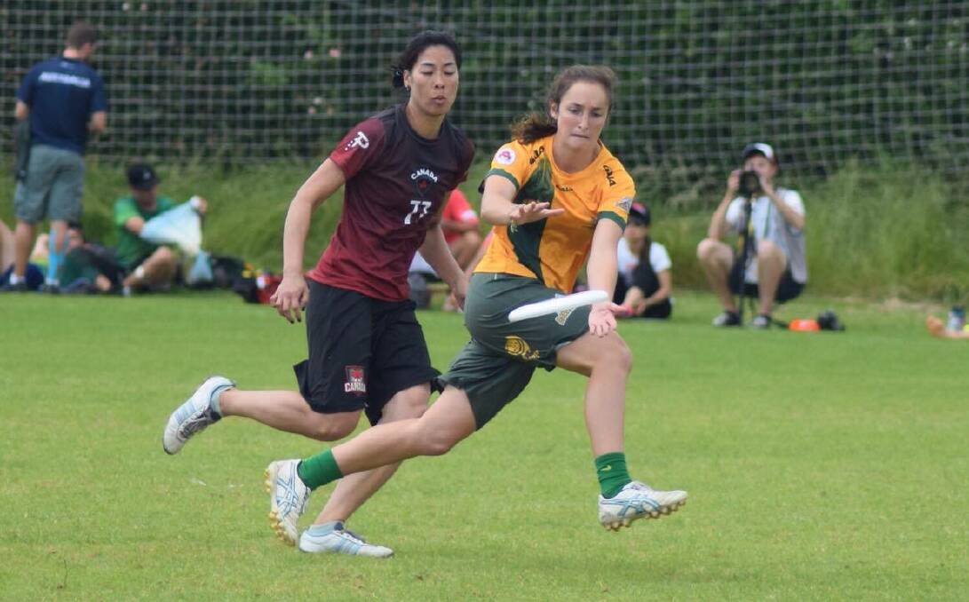 GREEN AND GOLD: Lauren Tink takes possession of the frisbee while representing Australia at the World Ultimate and Guts Championships in 2016. Tink won the silver medal at the tournament. 