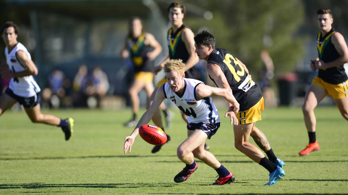 Riley Taylor dives for the ball during the Wimmera league's clash against the Murray Football League this year. Picture: RODNEY BRAITHWAITE/SHEPPARTON NEWS