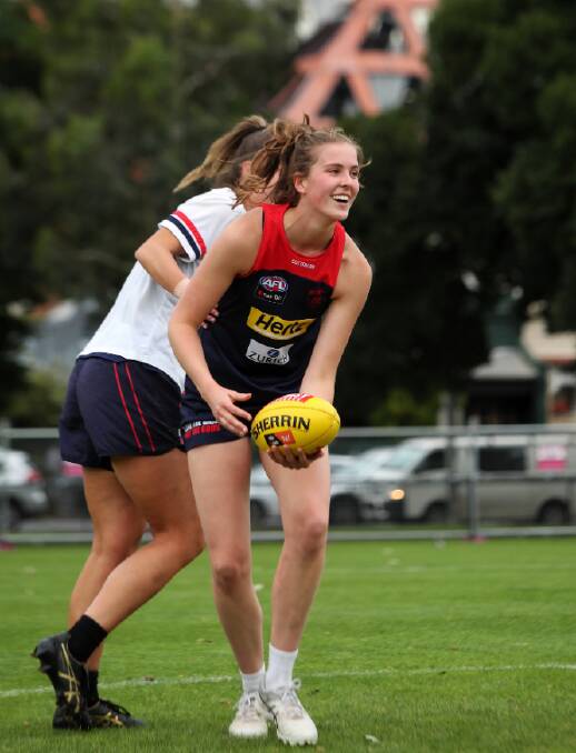 IN THE SWING OF IT: Horsham export Maggie Caris in action at a Demons' training session. Picture: MELBOURNE FC