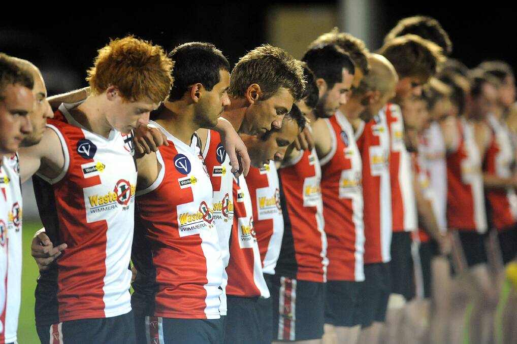 Saints players before the 2011 Anzac Day clash. 