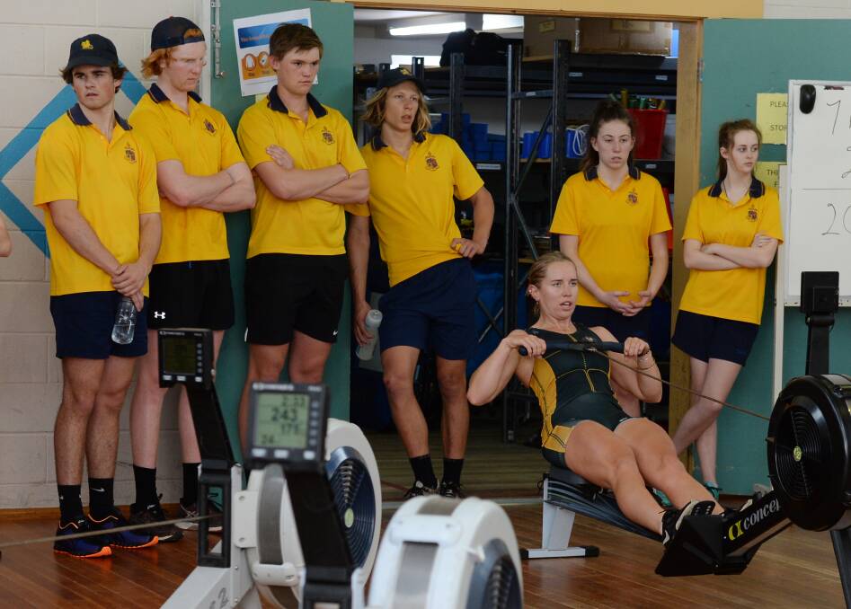 Lucy Stephan in action on the rowing machine on a visit back to Ballarat Grammar. Picture: Kate Healy