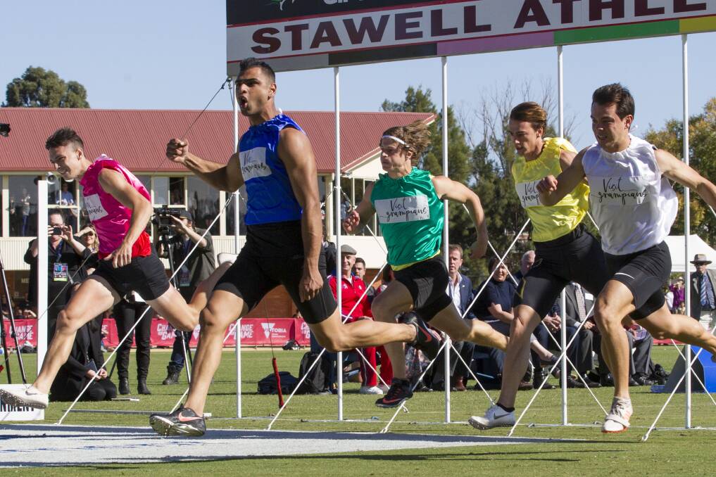 Dhruv Rodrigues Chico celebrates winning the 2019 Stawell Gift.