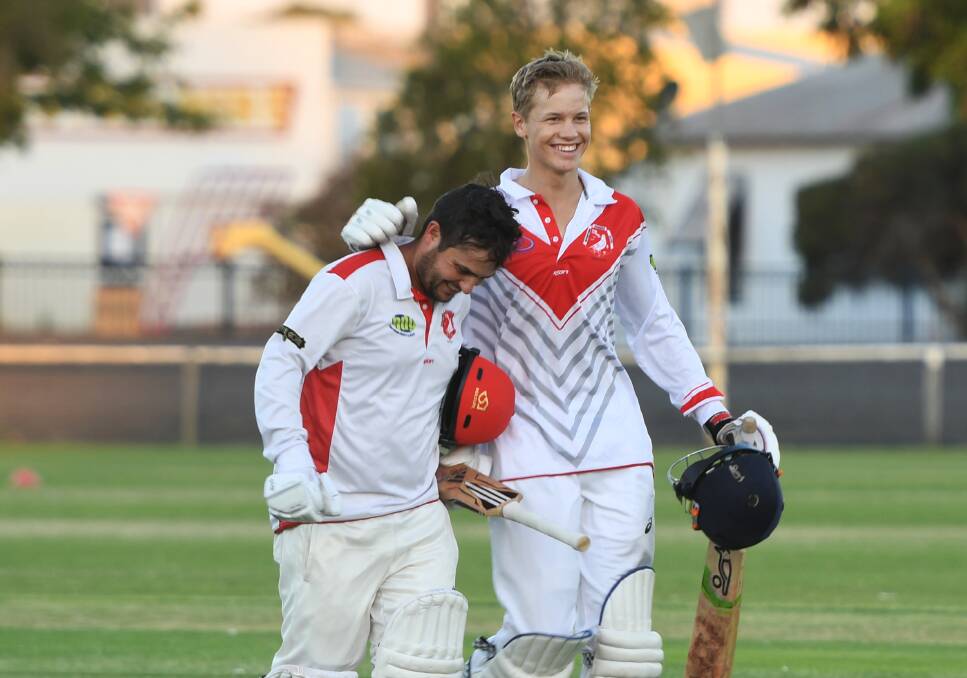 HAPPY DAYS: Adam Atwood and Paddy Mills celebrate Homers win. Picture: MATT CURRILL