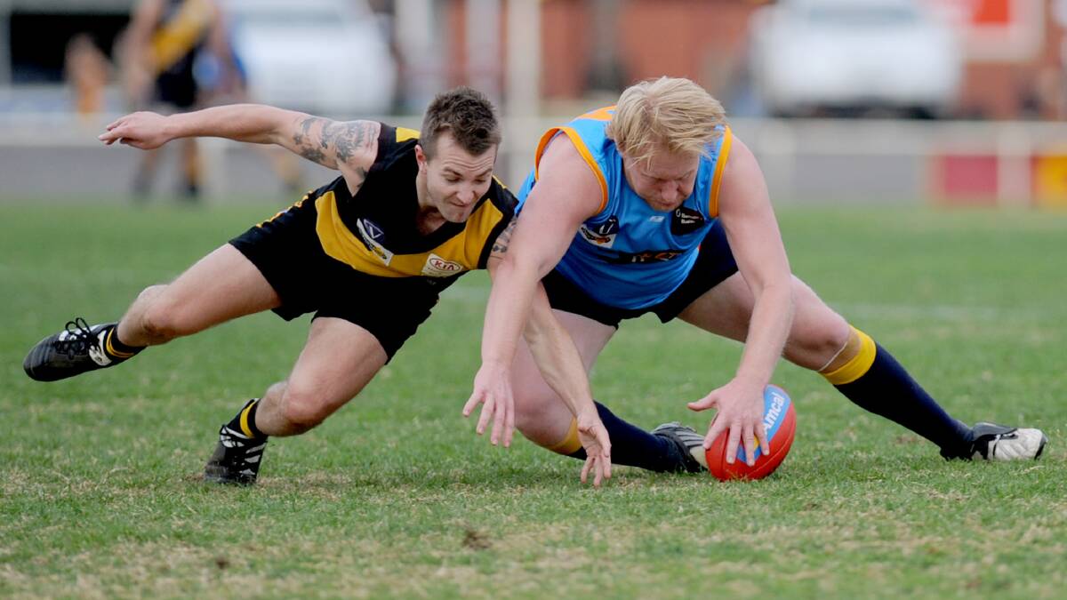 Luke Oldaker and Harley Lund, Horsham RSL Diggers, compete for the ball in 2012. 
