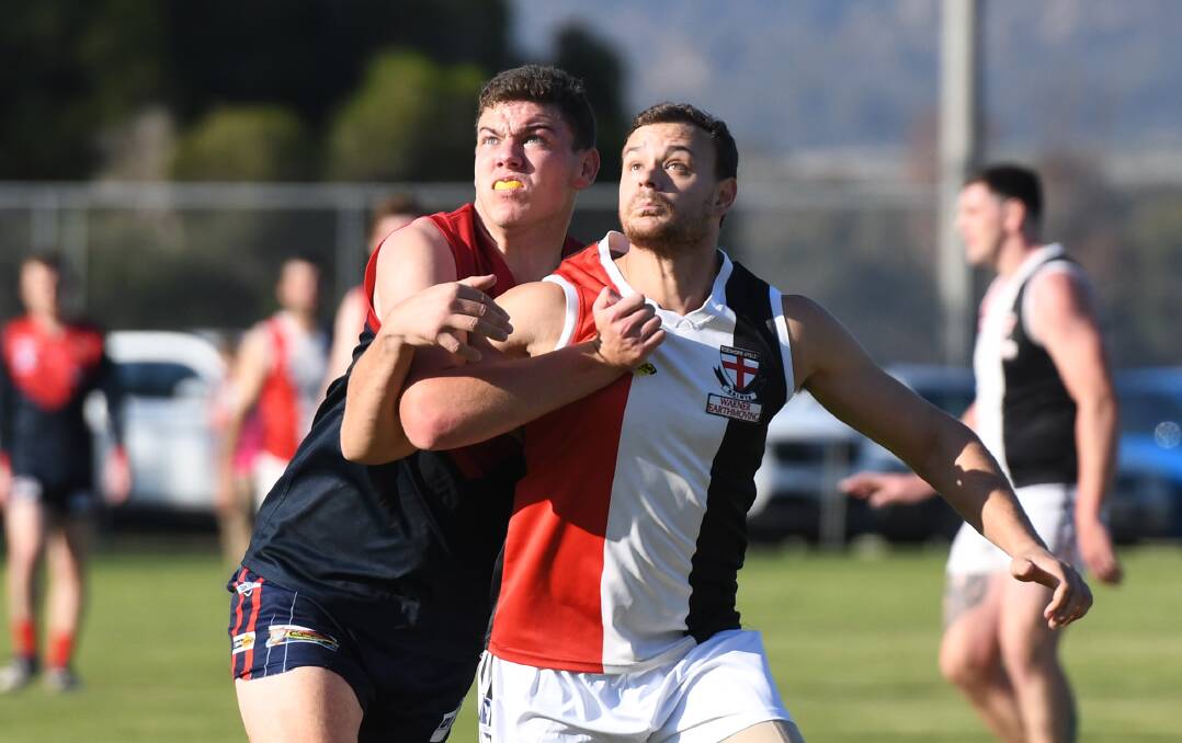 Laharum's Jed McConville jostles for best position with Edenhope-Apsley's Carl Slape. Picture: SAMANTHA CAMARRI