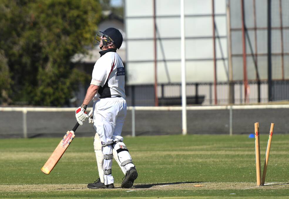 Horsham Saints' Mark Ferguson can only laugh after he is bowled. Picture: MATT CURRILL