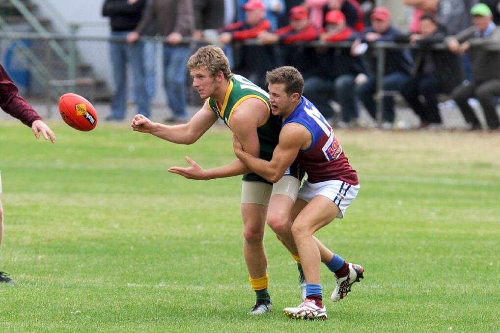 Lachlan Watts moves the ball on in 2013.
