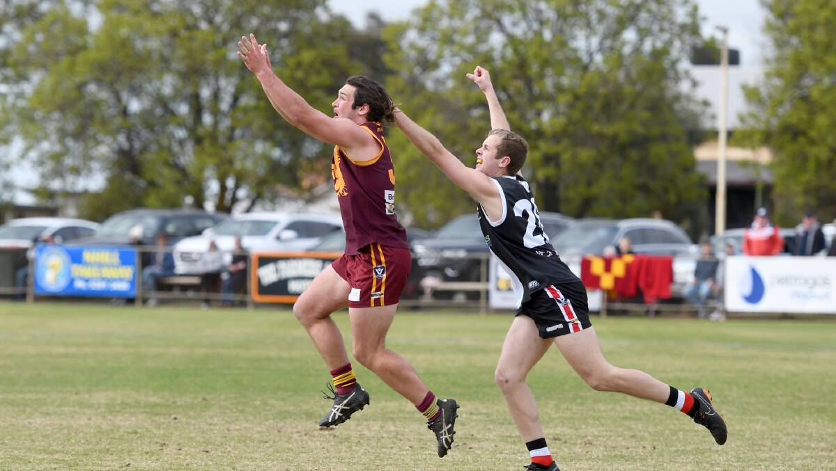 Watts' son Aaron playing for the Warrack Eagles last season. Picture: SAMANTHA CAMARRI