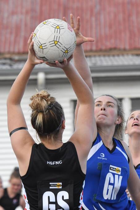 Jess Elder reaches to block against the Horsham Saints in the opening-round win. Picture: SAMANTHA CAMARRI