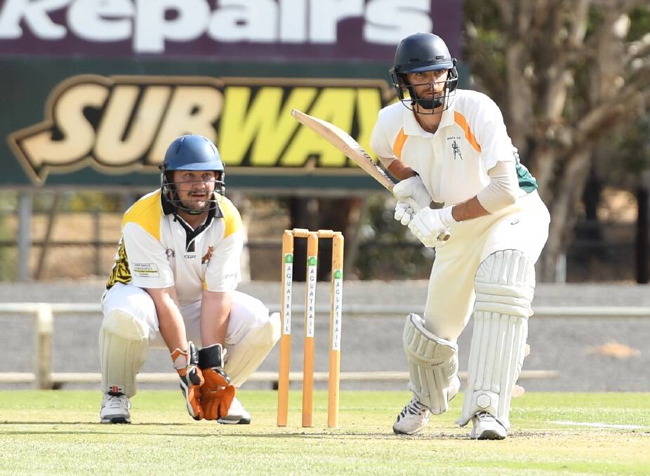 WATCHING CLOSELY: West Wimmera's Brad Alexander and Jung Tigers' keeper Brett Jensz are the picture of focus at the weekend. Picture: MATT CURRILL