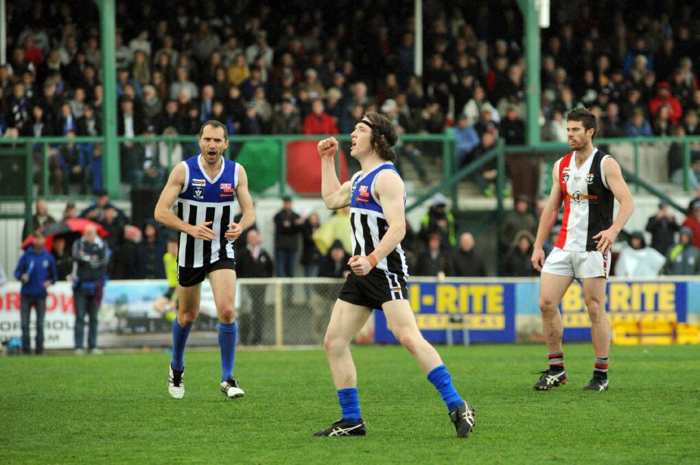 Nick Kelson celebrates a goal during the 2016 grand final. 