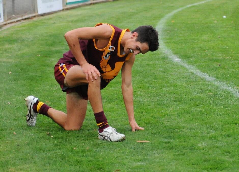 GETTING UP: Warrack Eagles' Lachie Stewart recovers after a big hit. Picture: MATT CURRILL