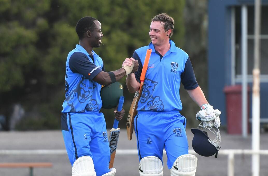  Mark Mbofana and Jamie Byrne celebrate Rup-Minyip's 2019-20 Twenty20 premiership. :Picture: MATT CURRILL