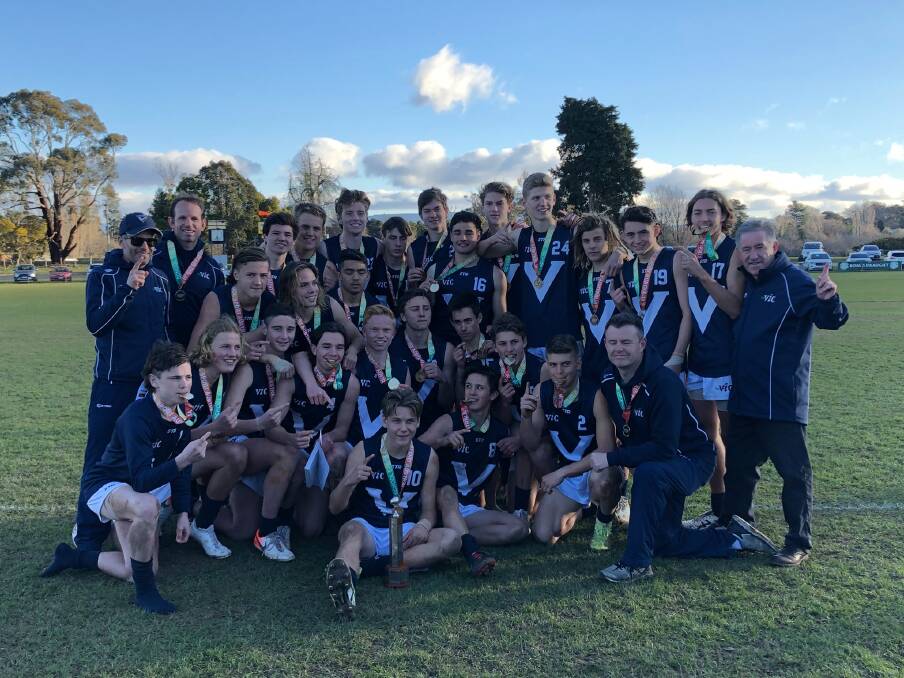 Brody Pope, standing in the back row, fourth from right, celebrates with his gold-medal winning Team Vic side at the School Sports Australia national championships in Tasmania. Picture: CONTRIBUTED