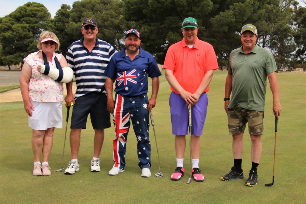 GOOD CAUSE: Libby and John Lacey, Shane Grover, Trevor Polkinghorne and Kim Croot had a busy day on the greens on Sunday. 